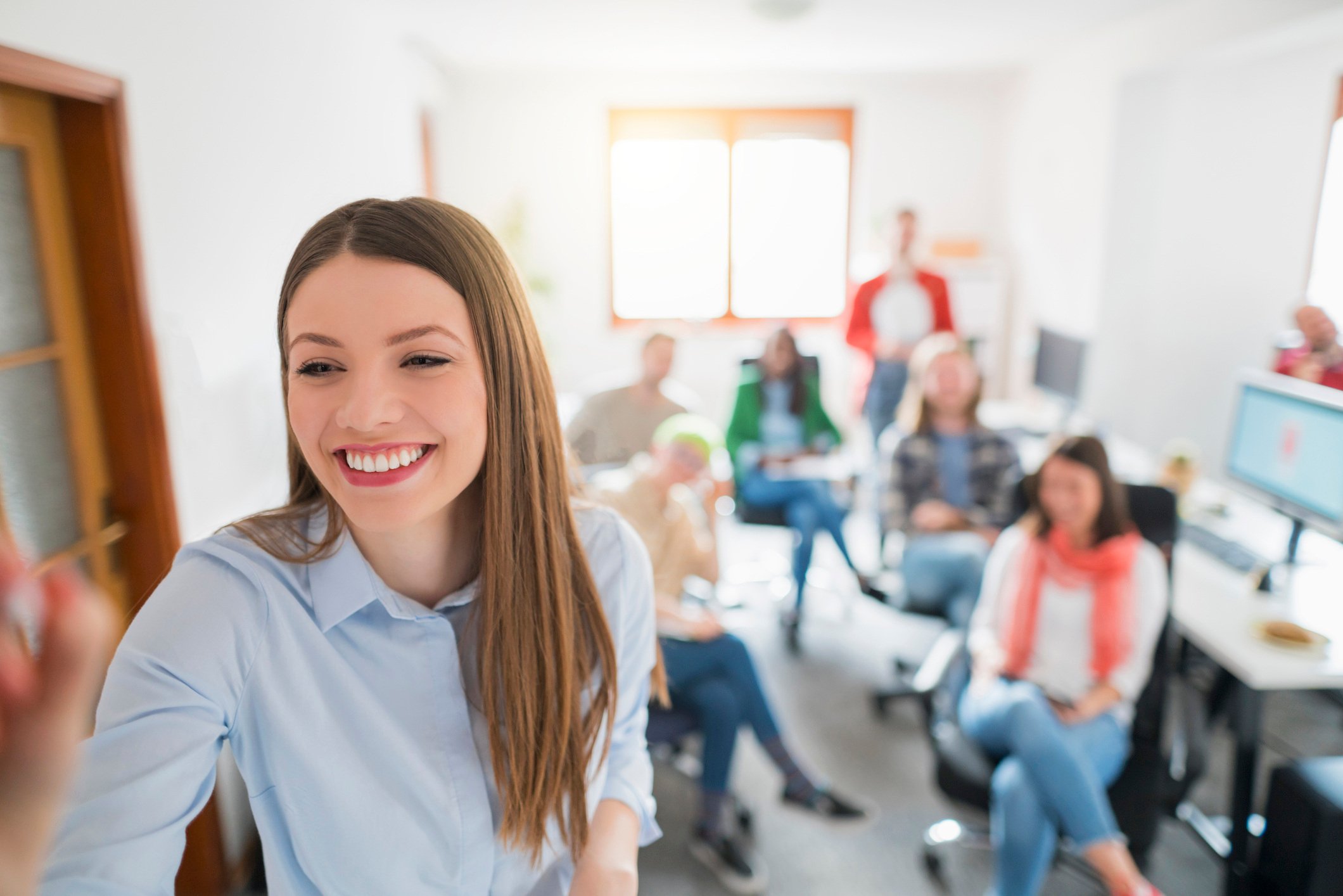 Engaging classroom environment showcasing face-to-face language training benefits for corporate learners.