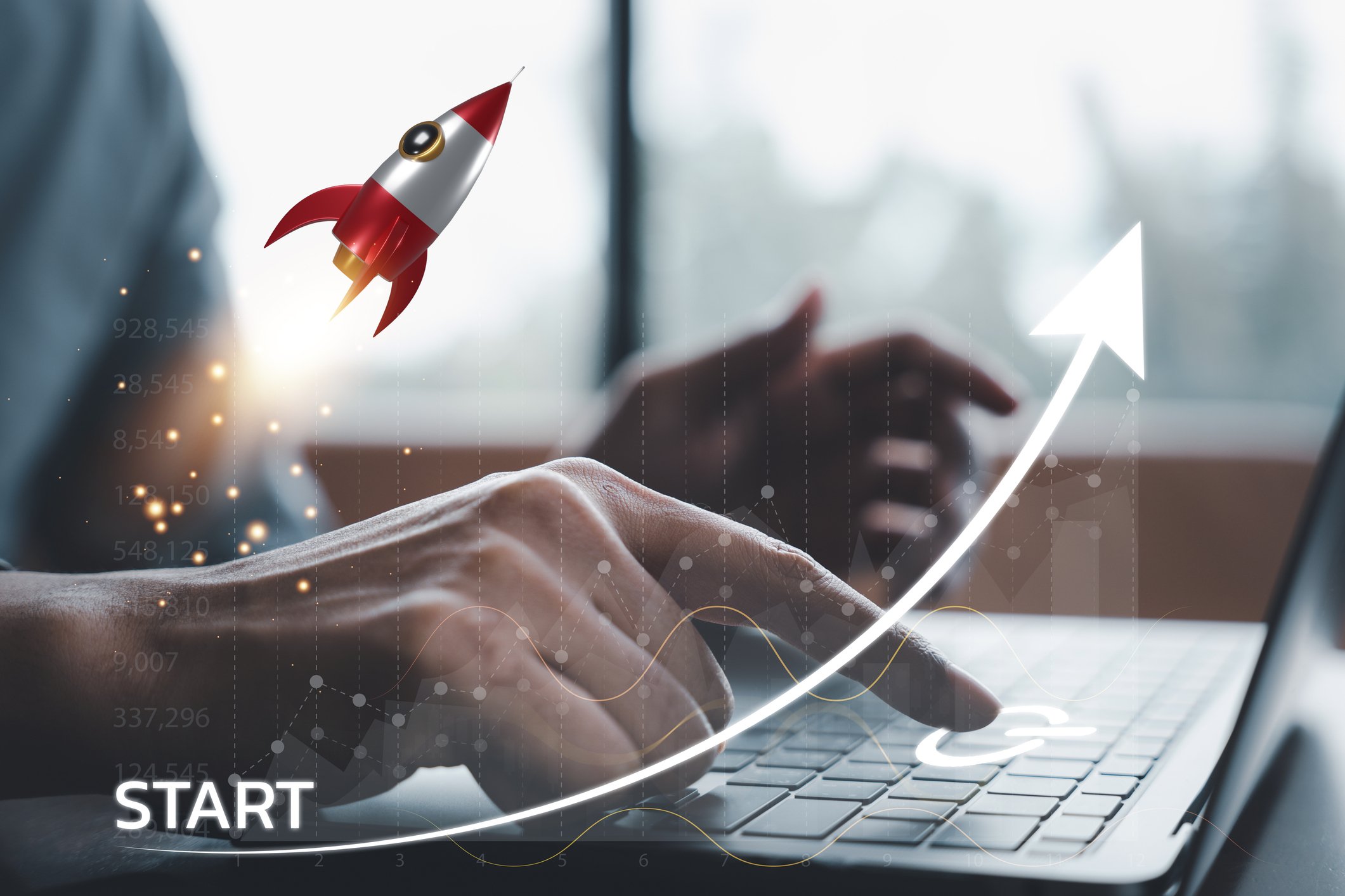 Driving growth in corporate language training: hand on laptop with rocket launch and upward arrow symbolizing learning success and maximizing ROI