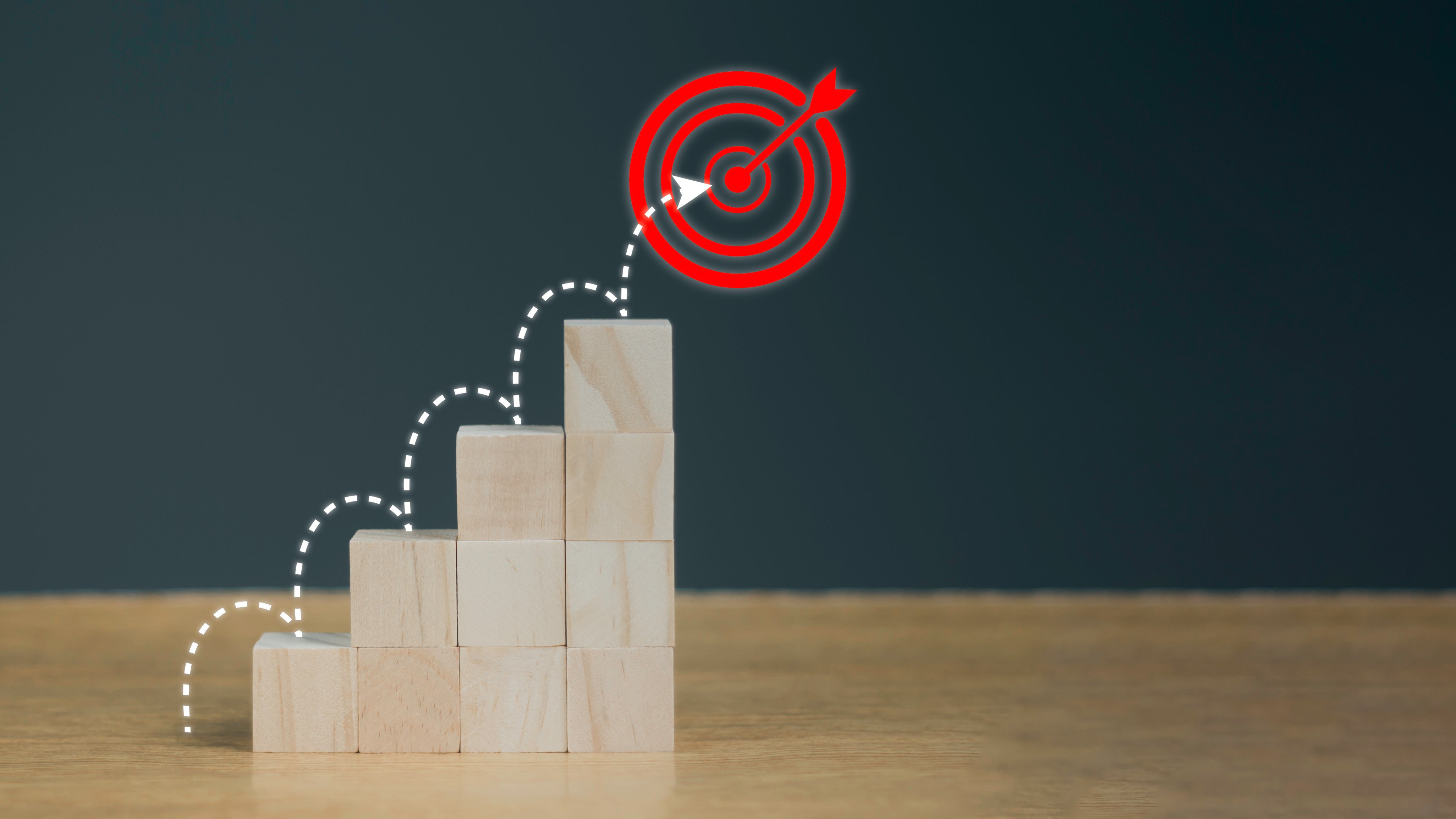 Step-by-step progress visualized through ascending blocks leading to a target, symbolizing ROI measurement in language training.