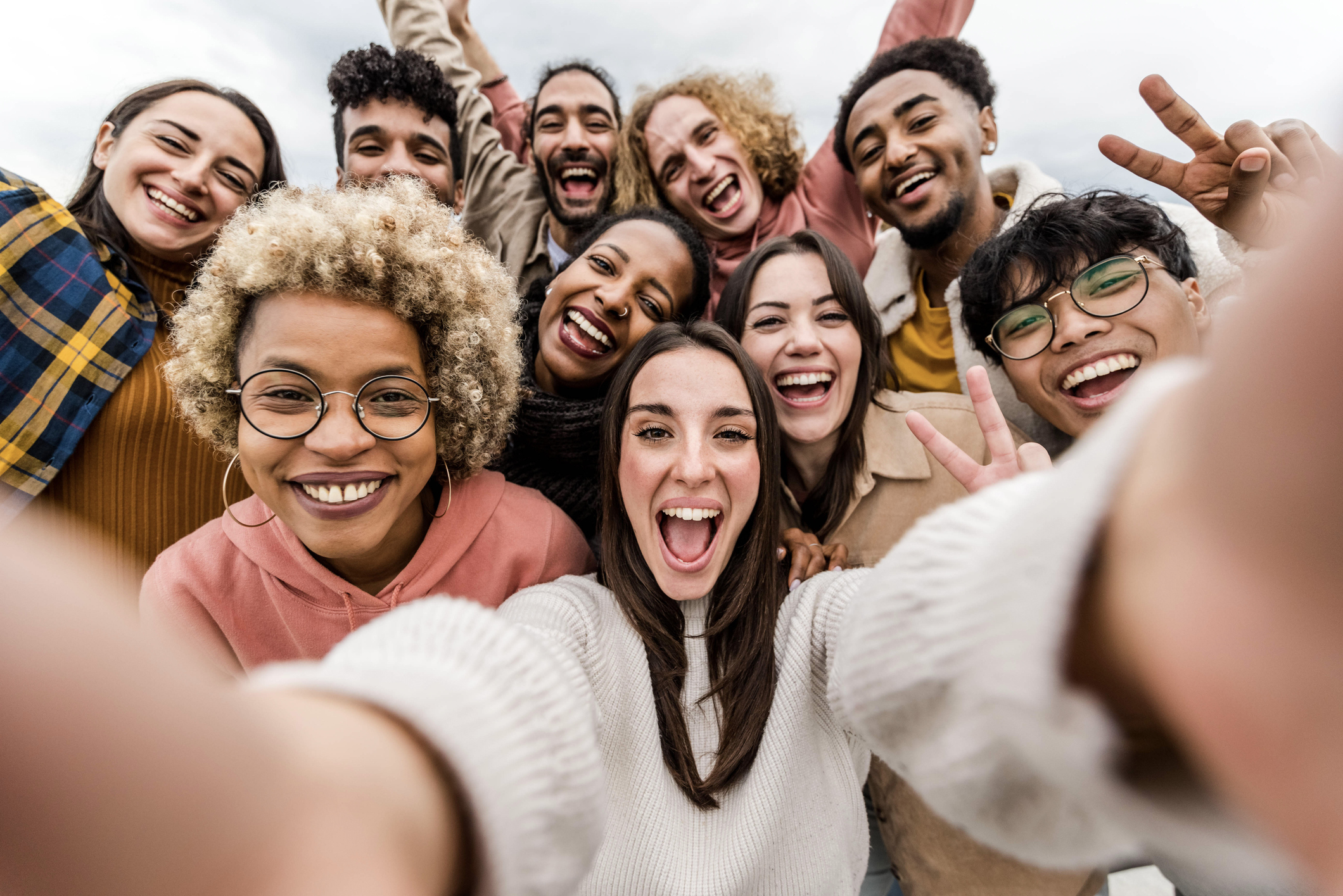 Diverse business team collaborating in a modern workplace, representing mYngle’s corporate language training and employment development solutions.
